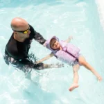 Жилетка за плуване с допълнителен ремък Splash About Люляк