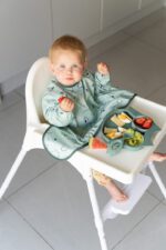 Tidy Tot лигавник с ръкави и вендузи за захващане за столче за хранене или маса Бухали